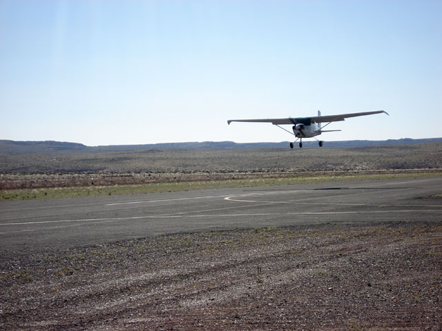 N5174A, flaps down, on final approach