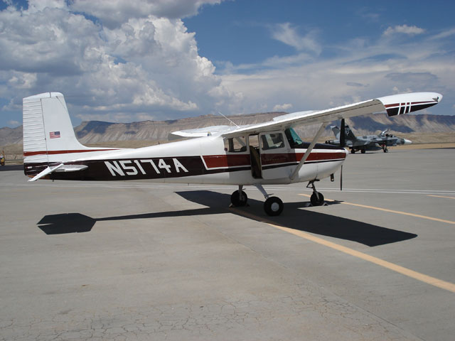 A lovely contrast between an old airplane and an even older one - a McDonald Douglas F-18 Hornet and N5174A, a 1956 Cessna 172